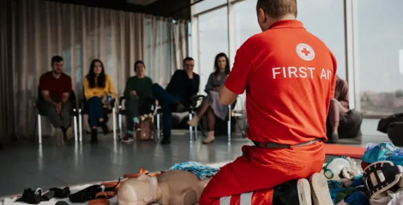 A First Aid Course being instructed by 4JH. This shows basic casualty assessment being carried out in front of a class of people.